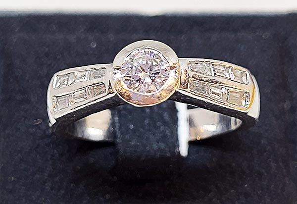 SOLITARIO ORO BLANCO 0.40CT. 1250€